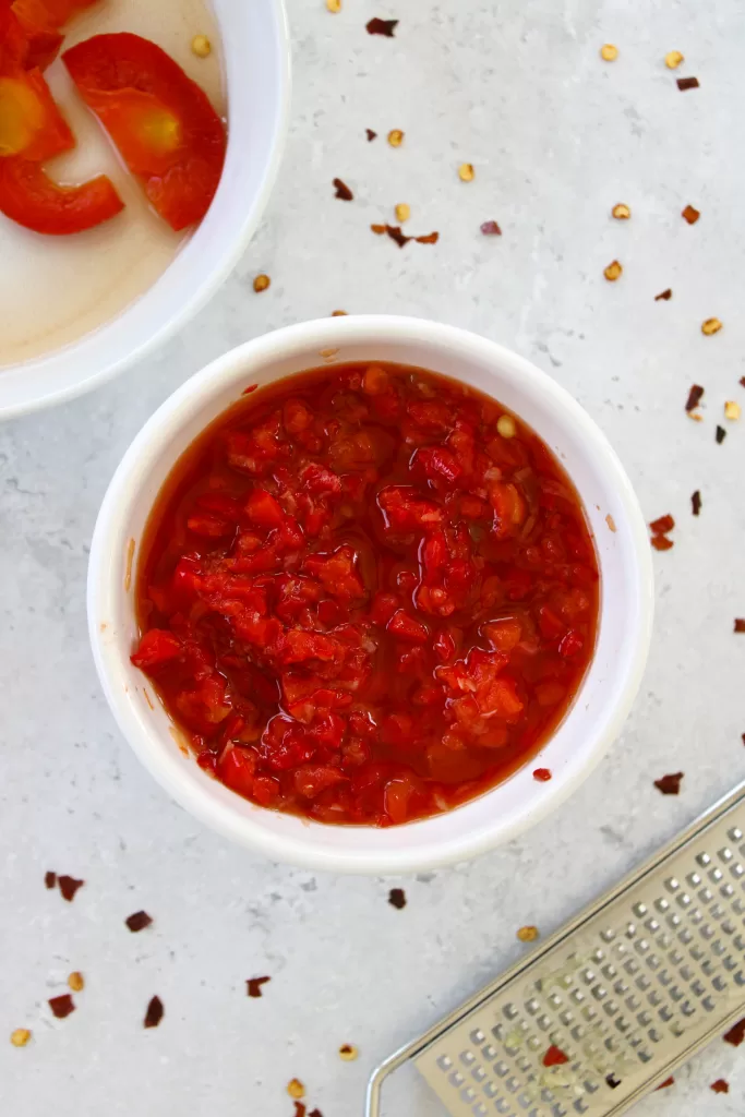 Cherry pepper relish in a small white bowl. 