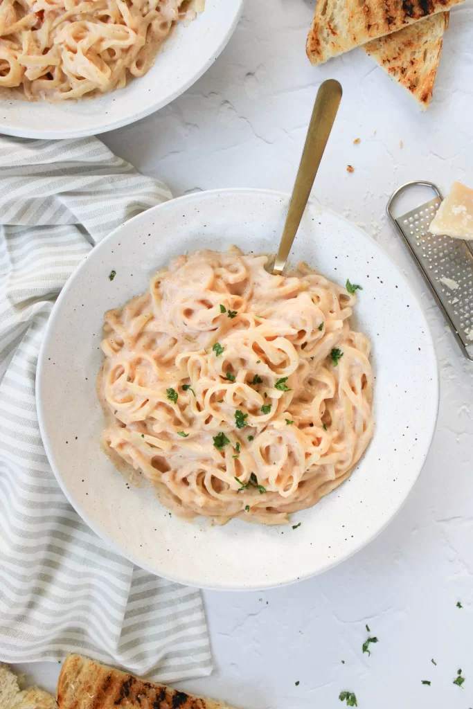 linguini pasta with homemade cajun alfredo sauce in a stone bowl 